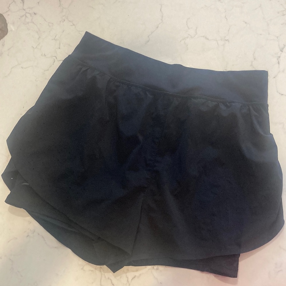 All in Motion black running shorts with compression shorts attached